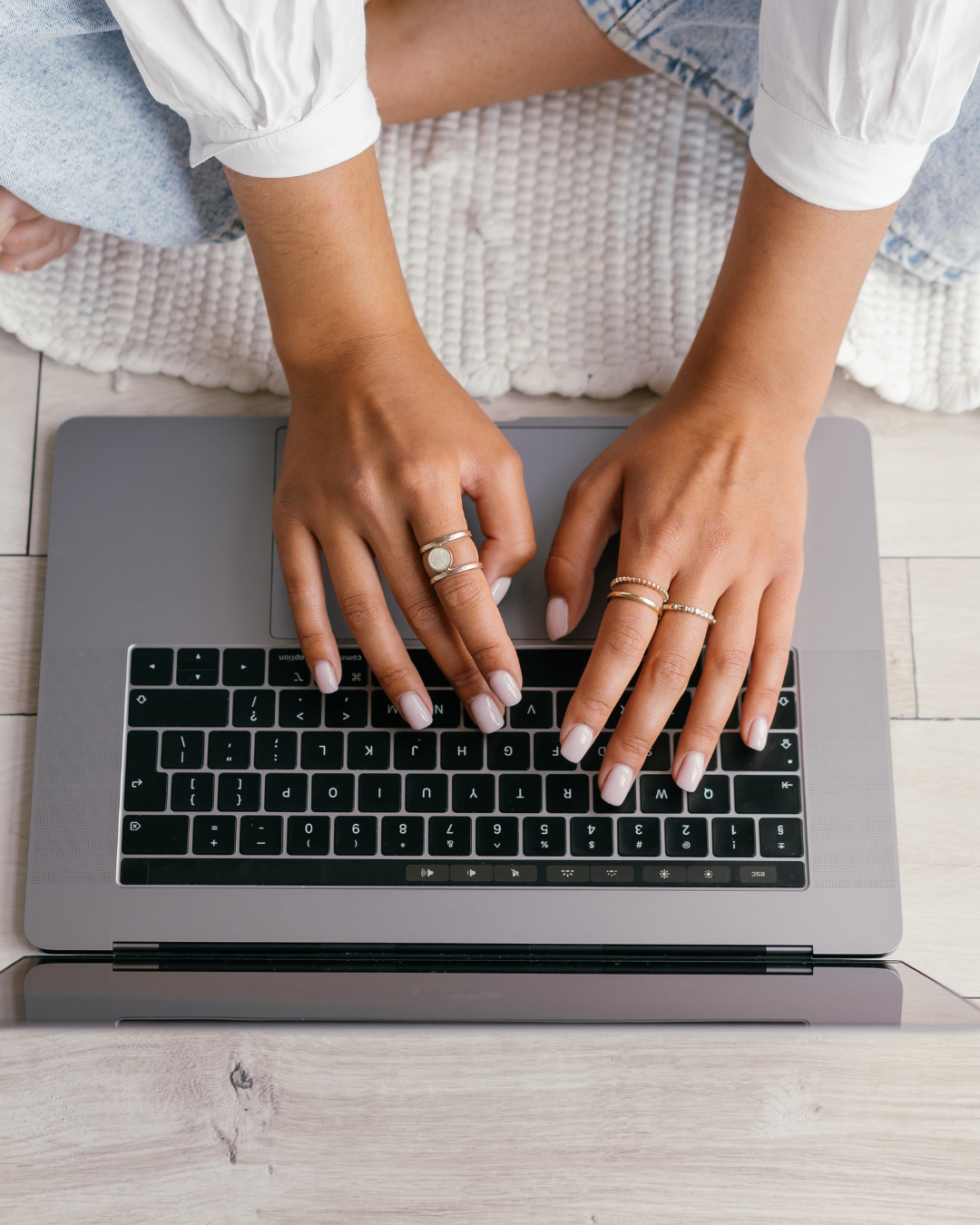 Woman writing an email subject line